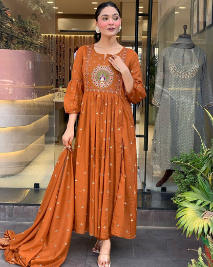 Elegant Rust Orange Anarkali Suit With Intricate Embroidery